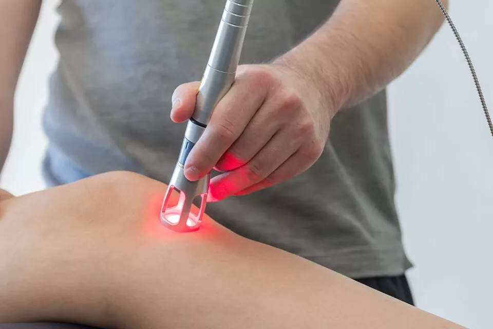 Low-level laser therapy (LLLT) session used for non-invasive body contouring and fat reduction